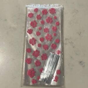 100 piece Plastic “Goodie Bag” with silver twist ties.